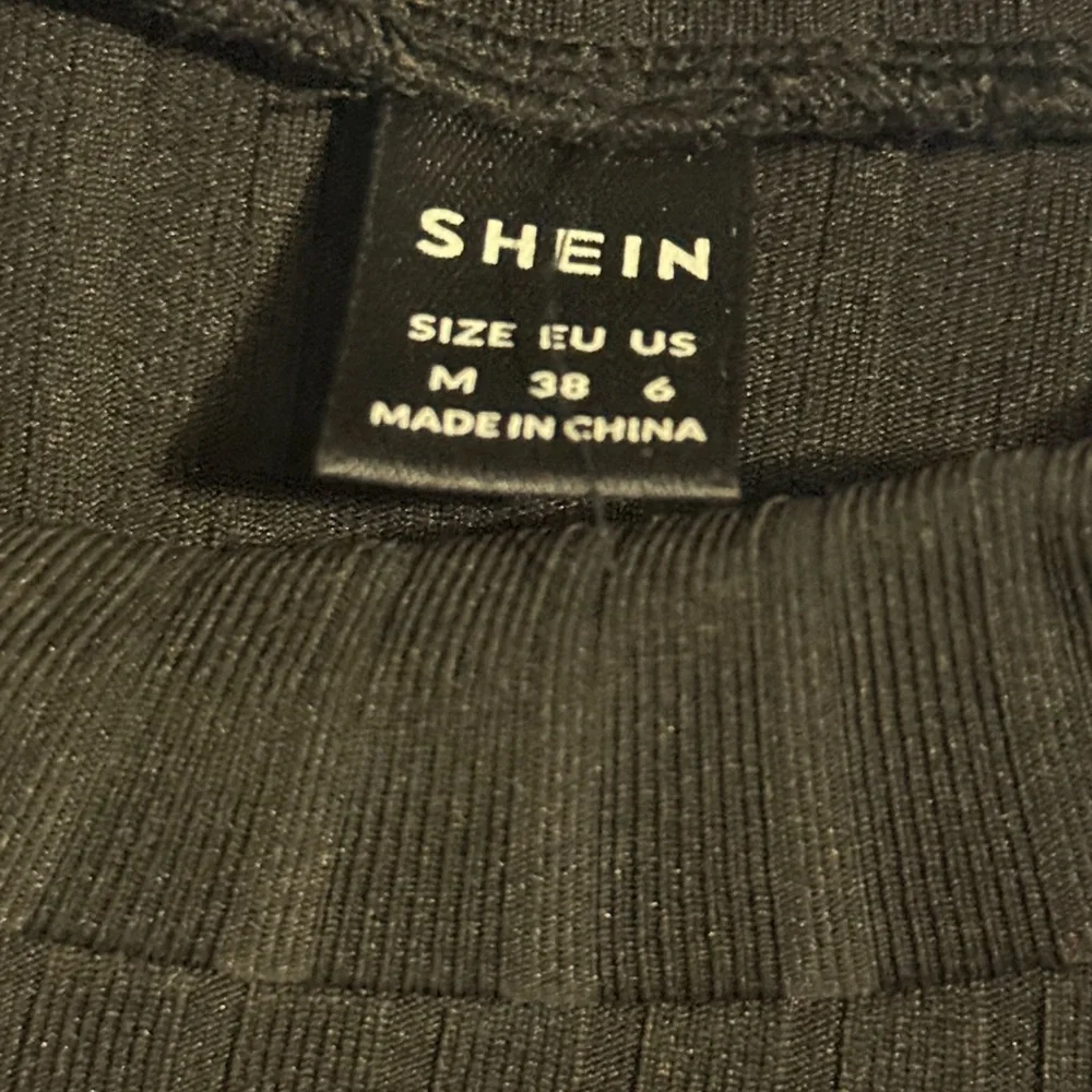 SHEIN Black Ruffled Ribbed Blouse - Picture 2 of 2